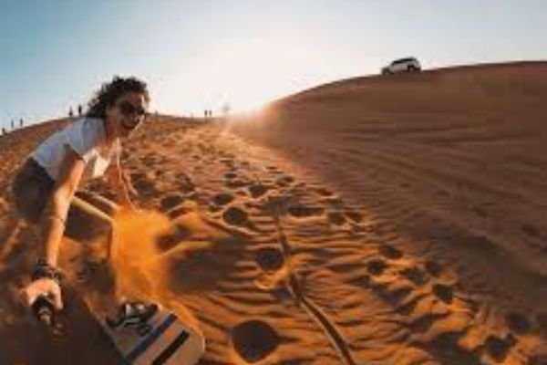 Camel ride during sunset in Dubai desert